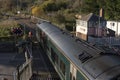 Signalman handing a key to train driver for travel on a single rail track