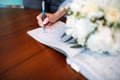 Signature of the bride at the wedding ceremony