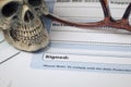 Signature field on document with pen and skull signed here; document is mock-up Royalty Free Stock Photo