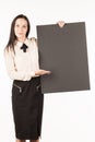 Signboard. Business woman with a big black card. on a white back Royalty Free Stock Photo