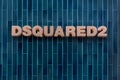 Signboard of Dsquared2 brand store on tiled wall