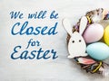 Signboard with the inscription We will be closed for Easter Royalty Free Stock Photo