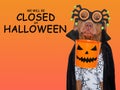 Signboard with the inscription We will be closed on Halloween Royalty Free Stock Photo