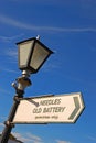 Signboard on Lamppost with direction to Needles Old Battery Royalty Free Stock Photo