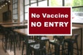 SIgnboard: No Vaccine, No Entry at a restaurant