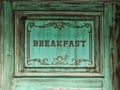 Signboard for a shop or cafe, breakfast. Rustic style boardof green color