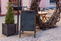 Signboard on the street. Empty menu board stand. Restaurant sidewalk chalkboard sign board. Freestanding A-frame Royalty Free Stock Photo