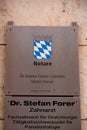 Signboard of an usher or notary office in Munich, Bavaria, Germany Royalty Free Stock Photo