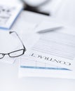 Signed contract paper with glasses Royalty Free Stock Photo