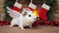 Guinea pig in angel costume by decorated fireplace Royalty Free Stock Photo