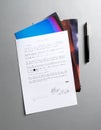 Signed Legal Document with Pen on Gray Background Royalty Free Stock Photo