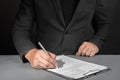 Signing contract, business agreement and deal concept. Closeup businessman reading before signing business contract documents Royalty Free Stock Photo