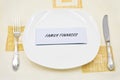 A Signing Family Finances on a Plate Royalty Free Stock Photo