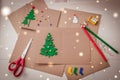 Signing Handmade Christmas cards. Felt, scissors, buttons, Christmas-tree, scrapping. Flat lay