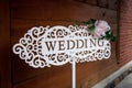 signpost directing to the wedding hall