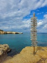 Signpost of direction of European capital cities on a wooden board in the coast against cloudy sky Royalty Free Stock Photo