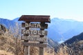 Signpost with mountains behind in Alps