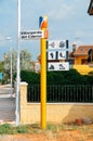 Signpost pointing to attractions including hiking trails to River Cabriel, whose depression forms a natural border with