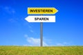 Signpost showing Invest or Safe Money german