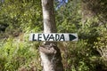 Signpost to levada on a tree in Madeira