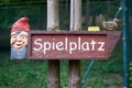 Signpost to a playground with the inscription Spielplatz