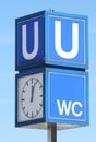 Signpost to Subway (U-Bahn) with Clock