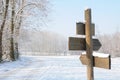 Signpost in Wintry countryside Royalty Free Stock Photo