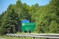 Signposts for Cape Breton Highlands Parks Canada along the Trans Canada Highway NS105, Exit 12