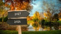 Signposts the direct way to 2026 versus 2027 Royalty Free Stock Photo