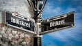 Signposts the direct way to Discreet versus Indiscreet Royalty Free Stock Photo