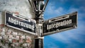 Signposts the direct way to integration versus demarcation Royalty Free Stock Photo