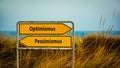 Signposts the direct way to optimism versus pessimism Royalty Free Stock Photo