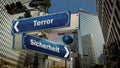 Signposts the direct way to security versus terror Royalty Free Stock Photo