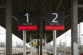 Signposts marking tracks in directions to Moscow and from Moscow in Saltykovskaya railway platform, Russia.