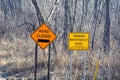 Signs on an Abandoned Dirt Road