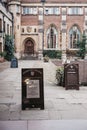 Signs in the courtyard of Pembroke College, Cambridge, UK Royalty Free Stock Photo
