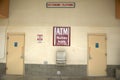 Signs directing people to ATM machine and restrooms, north of Tucson, AZ