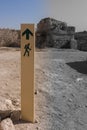 The signs in the direction of the old ruins. Black, White, Color Royalty Free Stock Photo