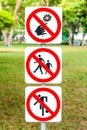 Signs in the park. Do not pick flowers, do not step on grass and do not play football