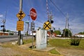 Signs in front of a railroad crossing Royalty Free Stock Photo