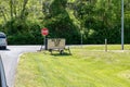 Signs at an Illinois park advise parkgoers to utilize social distancing