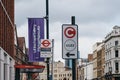 Signs indicating the direction of Ultra Low Emission Zone ULEZ on a street in London, UK Royalty Free Stock Photo