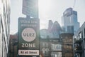 Signs indicating Ultra Low Emission Zone ULEZ on a street in London, UK Royalty Free Stock Photo