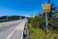 Signs and obelisks on the south end of the Rogue River Bridge at Gold Beach, Oregon, USA Royalty Free Stock Photo