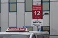 Signs for parking spaces and on rooftop of Taxis at the Rotterdam The Hague Airport.