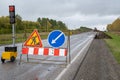Signs of repair of the road on a country road