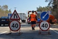 Signs repairs road and worker Royalty Free Stock Photo