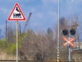 Signs set at the railway crossing Royalty Free Stock Photo