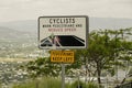 Signs on Side Of Mountain Warning Cyclists To Beware Of Pedestrians Royalty Free Stock Photo