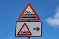 Signs warning of cattle grid and tramway Great Orme Llandudno North Wales May 2019 Royalty Free Stock Photo